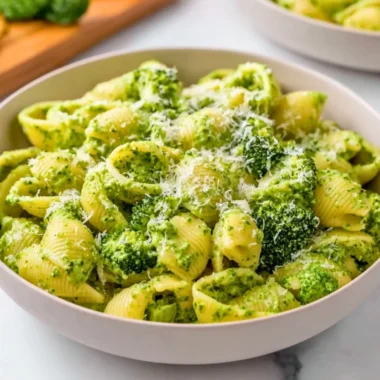 Healthy broccoli pasta dish with fresh vegetables and a savory sauce