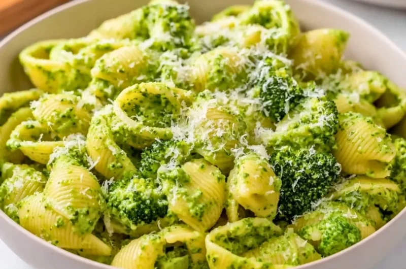 Healthy broccoli pasta dish with fresh vegetables and a savory sauce