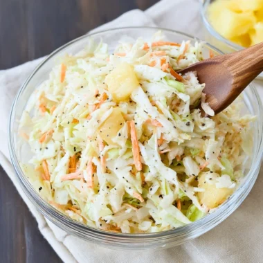 Bowl of colorful Hawaiian Coleslaw with fresh ingredients