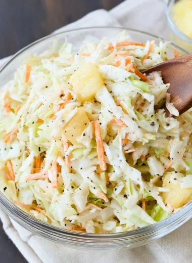 Bowl of colorful Hawaiian Coleslaw with fresh ingredients