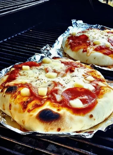 Delicious grilled pizza with colorful toppings on a wooden board
