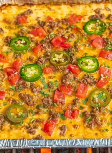 Delicious smoked queso dip served with tortilla chips