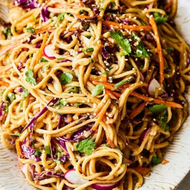 Asian Noodle Salad with Peanut Dressing served in a bowl