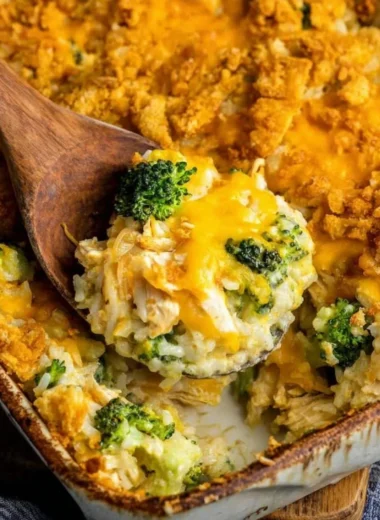 Broccoli cheddar chicken and rice casserole baked to perfection