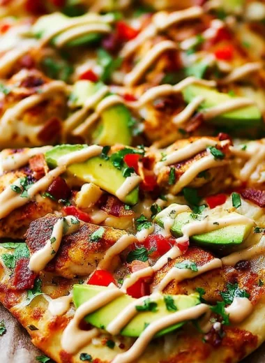California Chicken Flatbread topped with Chipotle Ranch sauce and fresh ingredients