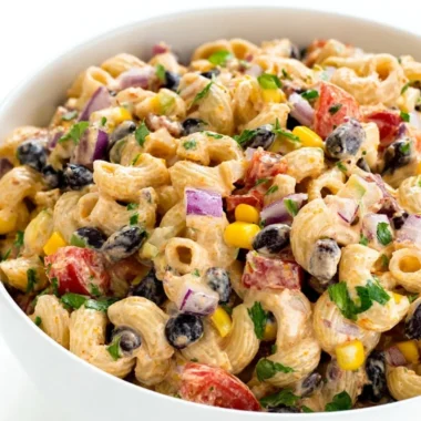 Colorful Mexican Pasta Salad with fresh ingredients, served in a bowl.