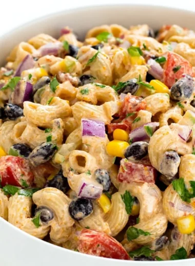 Colorful Mexican Pasta Salad with fresh ingredients, served in a bowl.
