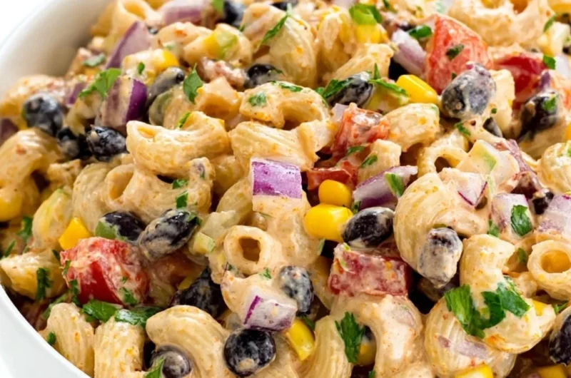 Colorful Mexican Pasta Salad with fresh ingredients, served in a bowl.