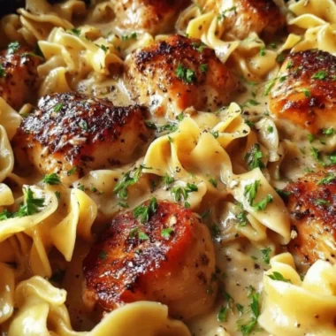 Delicious one-pan creamy garlic butter chicken served over egg noodles