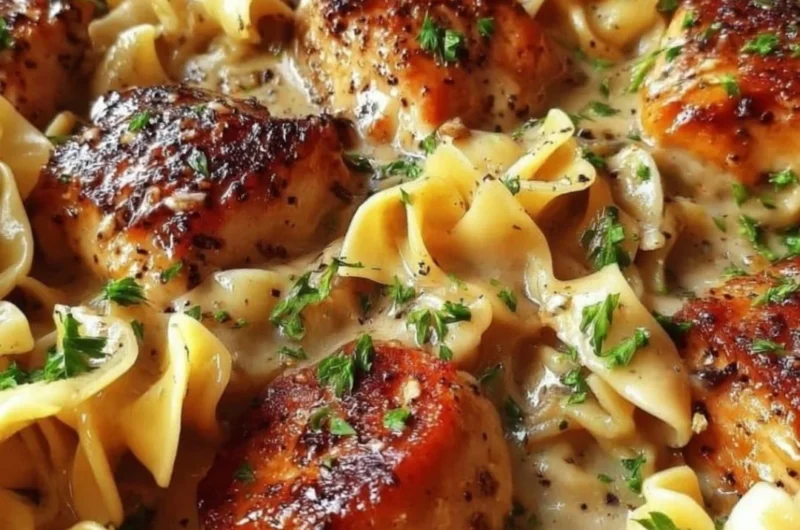 Delicious one-pan creamy garlic butter chicken served over egg noodles