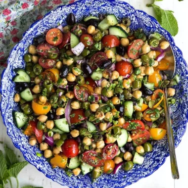 Trader Joe's Balela Salad imitation served in a bowl with fresh vegetables.