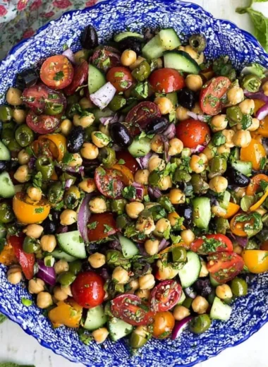 Trader Joe's Balela Salad imitation served in a bowl with fresh vegetables.