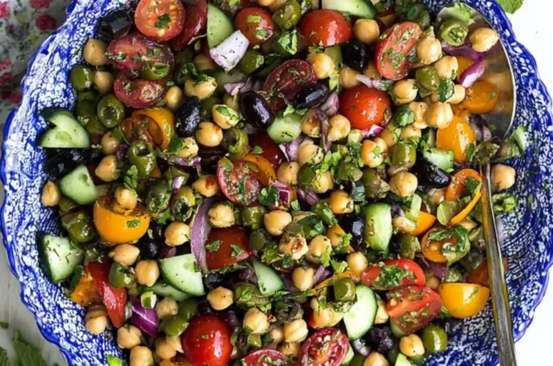 Trader Joe's Balela Salad imitation served in a bowl with fresh vegetables.