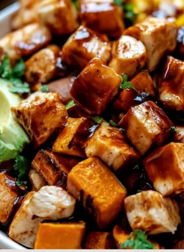 BBQ Chicken Sweet Potato Bowl topped with fresh ingredients