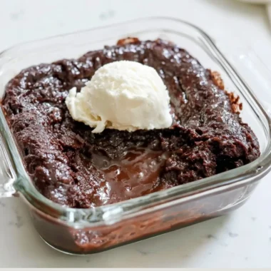 Delicious Cottage Cheese Lava Cake with a gooey center served on a plate.