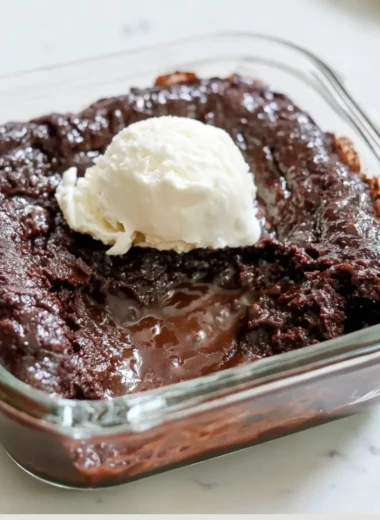 Delicious Cottage Cheese Lava Cake with a gooey center served on a plate.