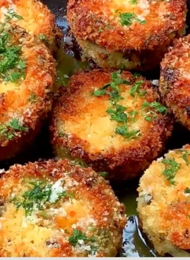 Delicious crispy breaded eggplant slices ready to be served as an appetizer.