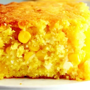 Easter Corn Casserole served in a baking dish, garnished and ready to enjoy.