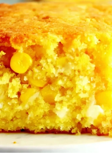 Easter Corn Casserole served in a baking dish, garnished and ready to enjoy.