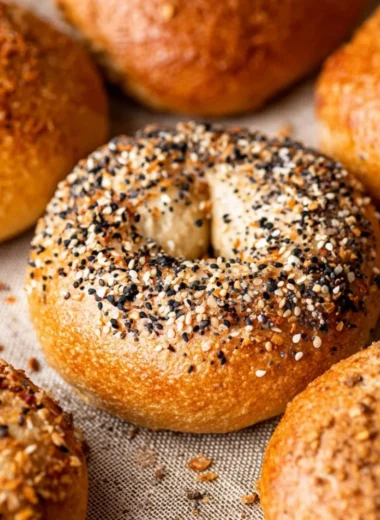 Freshly baked easy homemade bagels on a wooden table