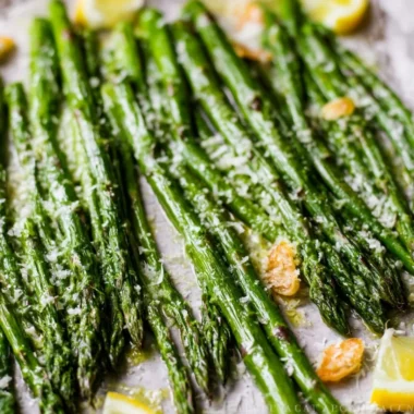 Delicious Garlic Parmesan Oven Roasted Asparagus served on a plate