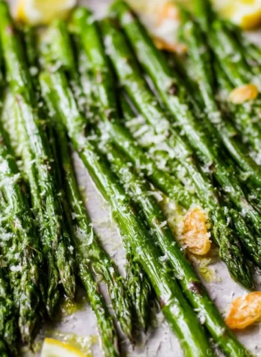 Delicious Garlic Parmesan Oven Roasted Asparagus served on a plate