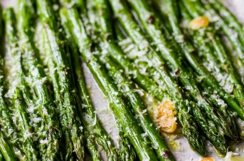 Delicious Garlic Parmesan Oven Roasted Asparagus served on a plate