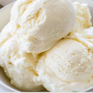 Delicious homemade no-churn ice cream in a bowl with toppings