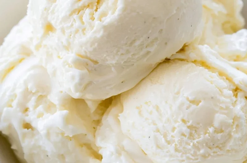 Delicious homemade no-churn ice cream in a bowl with toppings