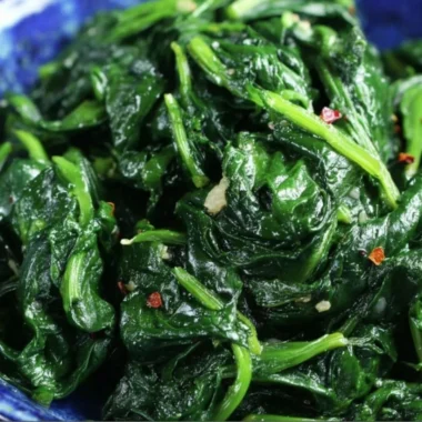 Delicious quick and easy sautéed spinach cooked with garlic and olive oil.