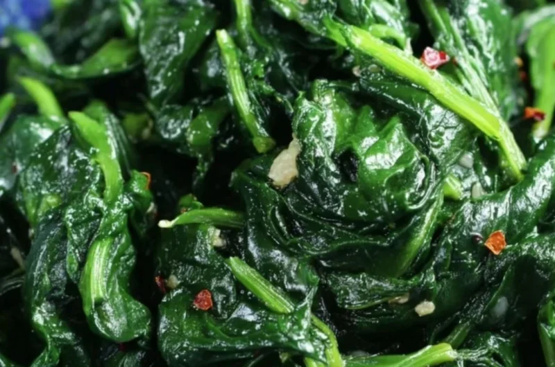 Delicious quick and easy sautéed spinach cooked with garlic and olive oil.