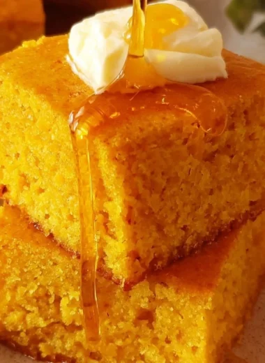 Delicious slice of sweet potato cornbread with a golden crust