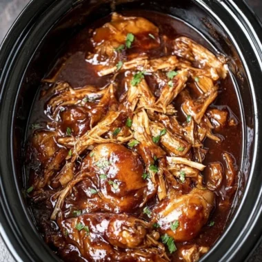 Delicious crock pot bourbon chicken served with vegetables