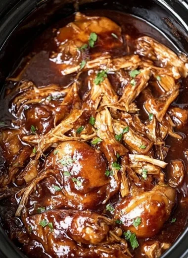 Delicious crock pot bourbon chicken served with vegetables