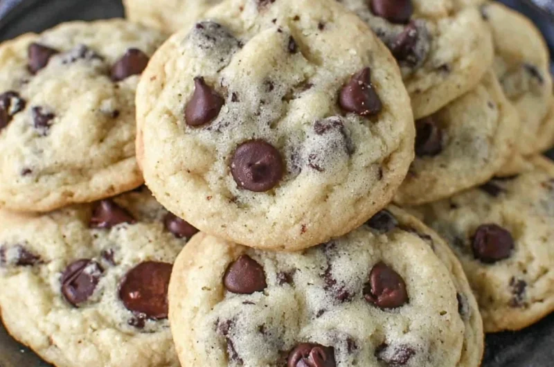 Freshly baked yogurt chocolate chip cookies cooling on a wire rack