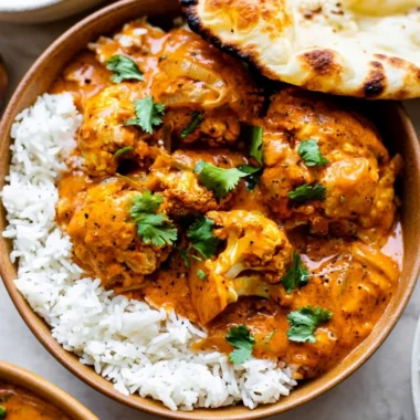 Delicious butter cauliflower dish garnished with herbs and spices