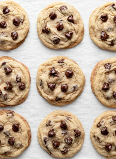 Baking a batch of easy chocolate chip cookies on a cooling rack.
