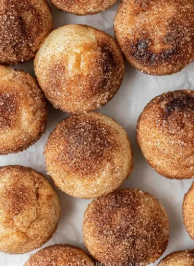 Mini French Breakfast Puffs served on a breakfast table with coffee and pastries
