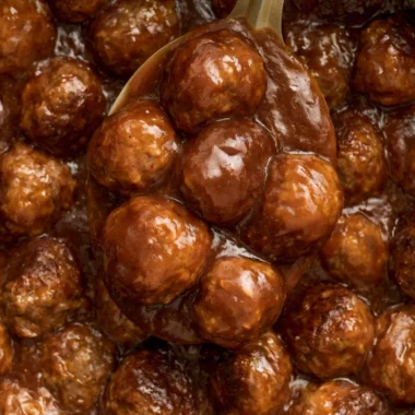 Slow Cooker Salisbury Steak Meatballs served with gravy over mashed potatoes