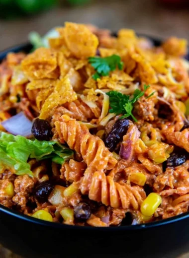Colorful Taco Pasta Salad with fresh ingredients and toppings.