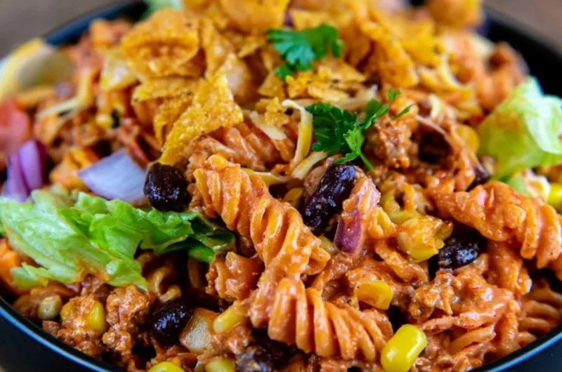 Colorful Taco Pasta Salad with fresh ingredients and toppings.