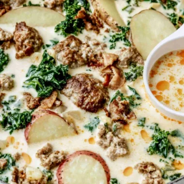 Bowl of hearty Tuscany Soup with fresh vegetables and herbs