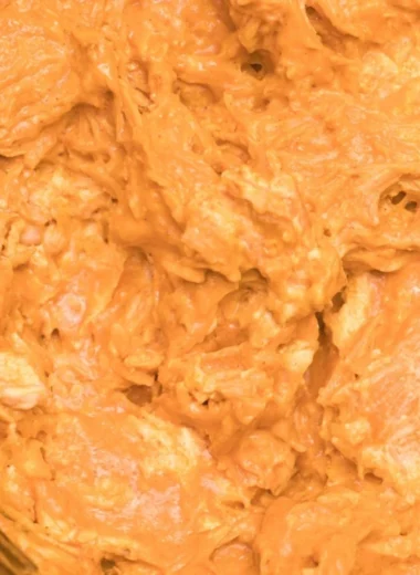 Delicious Crockpot Buffalo Chicken Dip served in a bowl with tortilla chips.
