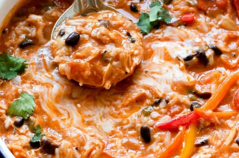 Bowls of Pepper Jack Chicken Fajita Soup with colorful vegetables and rice