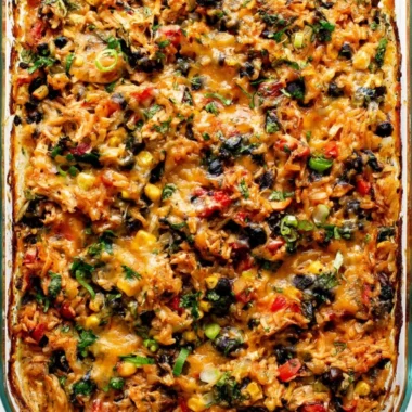 Protein-packed burrito bake topped with cheese and fresh ingredients.