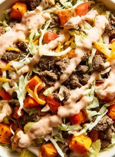 Sweet Potato Burger Bowl topped with ground beef and fresh ingredients