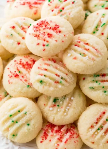 Delicious whipped shortbread cookies on a plate, perfect for any occasion.