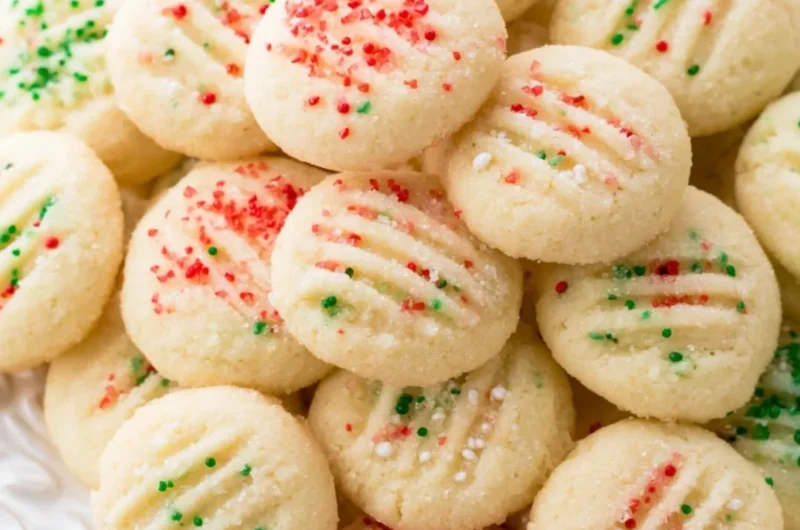 Delicious whipped shortbread cookies on a plate, perfect for any occasion.
