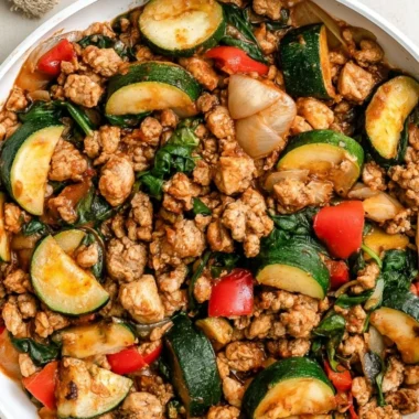 Whole30 Turkey Taco Skillet with ground turkey and zucchini in a colorful dish